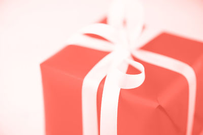 Close-up of red paper against white background