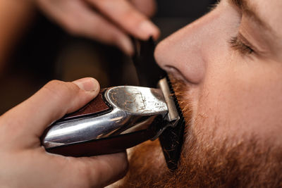 Cropped image of man holding key ring