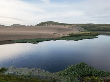 Scenic view of lake against sky