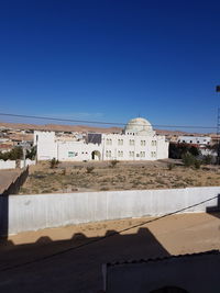 Buildings against blue sky