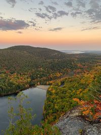 Scenic view of landscape against sky during sunset