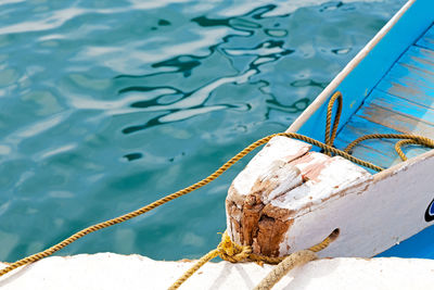 High angle view of rope tied on boat