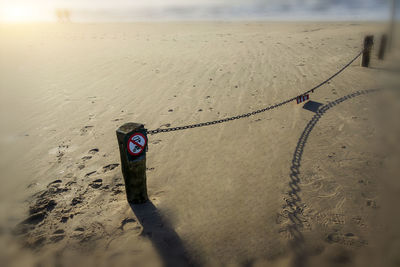 High angle view of text on beach