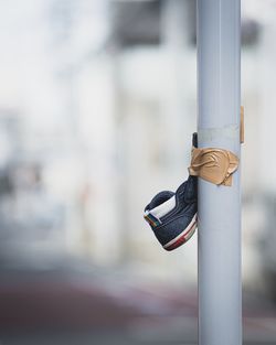 Close-up of rope tied to pole