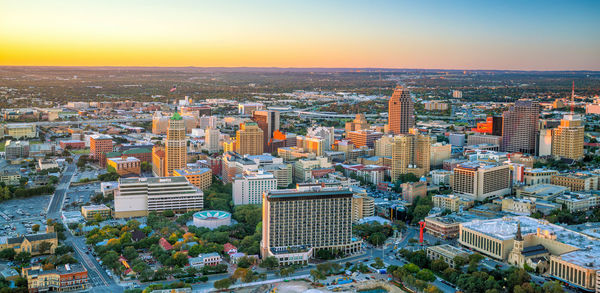 High angle view of cityscape against sky during sunset