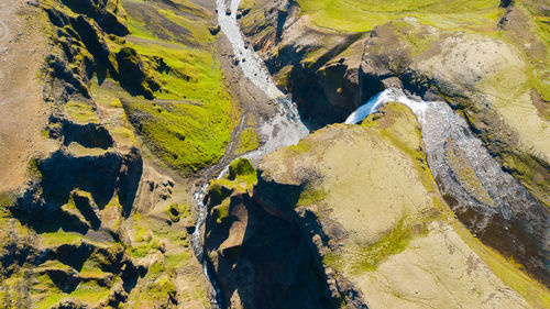 High angle view of rocks in river