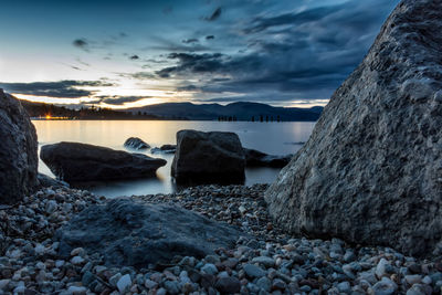 Scenic view of sea against sky at sunset