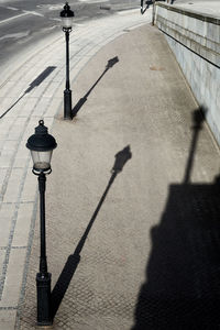High angle view of street light on sidewalk