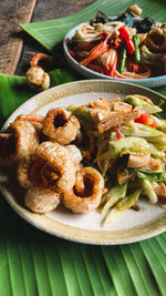 Close-up of food served on table