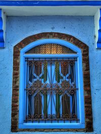 Closed blue window of building