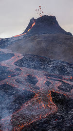 View of volcanic landscape against sky