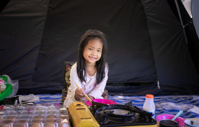 Portrait of smiling girl standing
