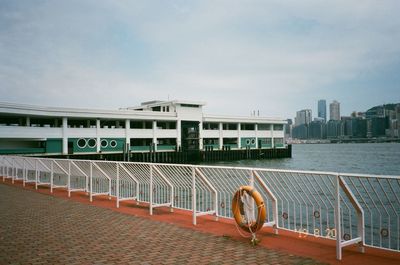 View of bridge over river against buildings in city