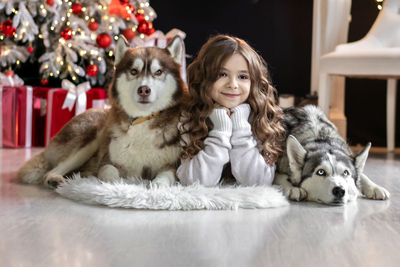 Portrait of young woman with dog