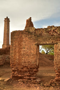 Old ruins of building against sky