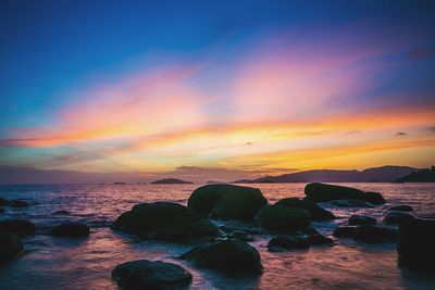 Scenic view of sea against sky during sunset