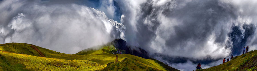 Panoramic view of mountain range against sky