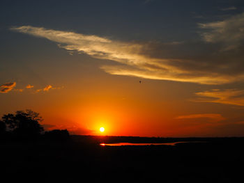 Scenic view of silhouette landscape against sky during sunset