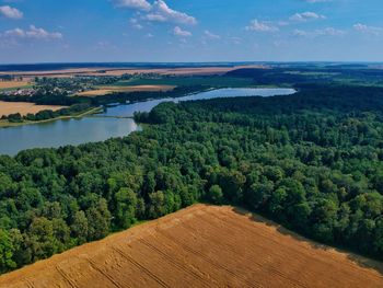 High angle view of trees on landscape against sky