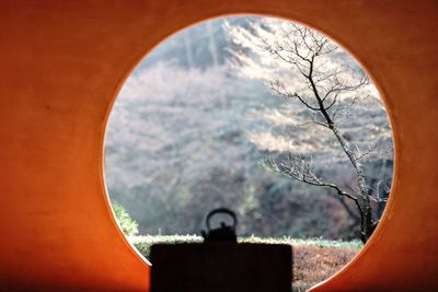 Silhouette kettle on table in temple