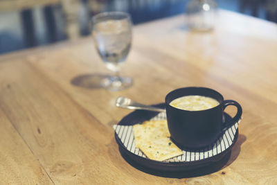 Close-up of coffee cup on table