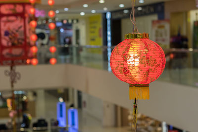 Close-up of illuminated lantern hanging at night