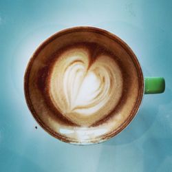 Close-up of cappuccino on table