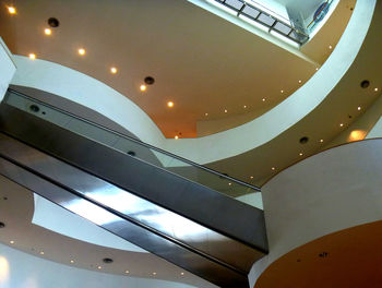 Low angle view of illuminated ceiling