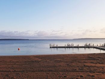 Scenic view of beach against sky