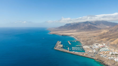 Scenic view of sea against blue sky