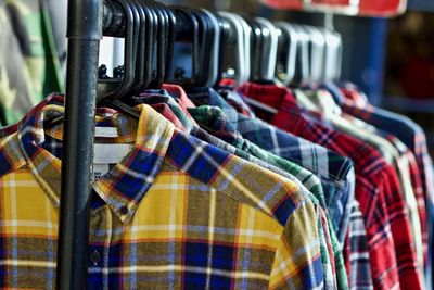 Close-up of multi colored shirts for sale in store