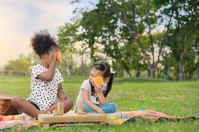 Women sitting on grass