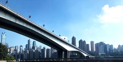 Modern buildings in city against sky