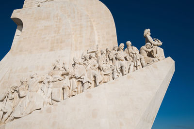 Low angle view of statue against sky