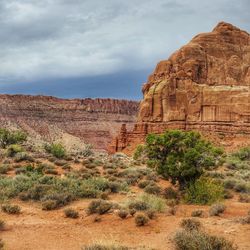Scenic view of canyonlands national park against cloudy sky