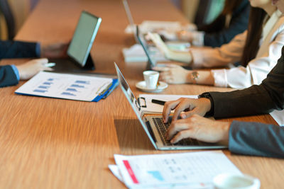 Man using laptop on table