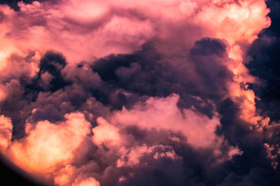 Low angle view of clouds in sky during sunset