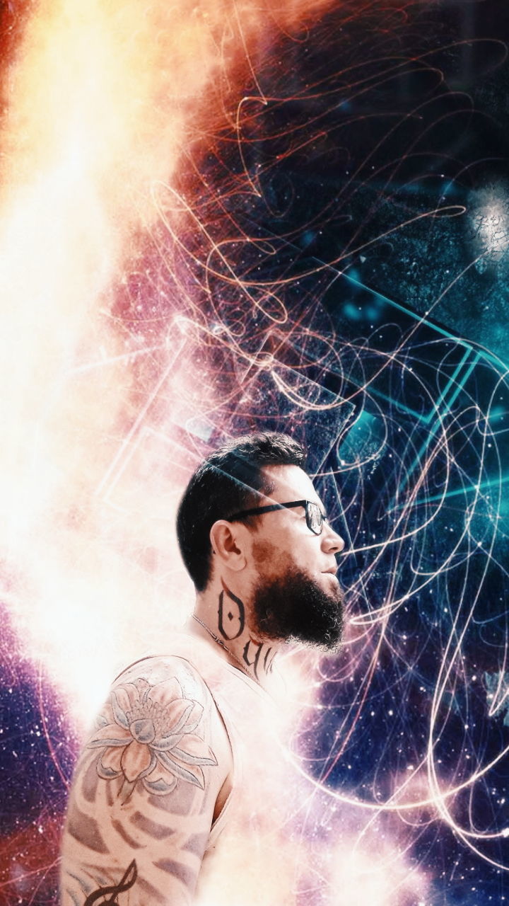 one person, real people, young adult, lifestyles, indoors, young men, front view, leisure activity, tattoo, portrait, casual clothing, adult, beard, headshot, illuminated, standing, light - natural phenomenon, men, digital composite