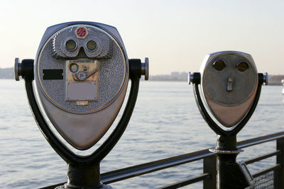 Binoculars facing calm sea