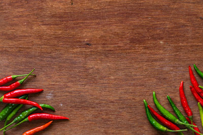 Directly above shot of chili peppers on table