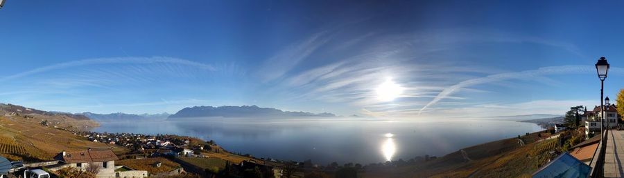 Scenic view of mountains against blue sky