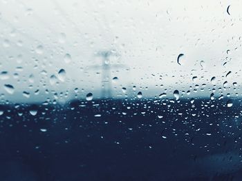 Full frame shot of raindrops on window