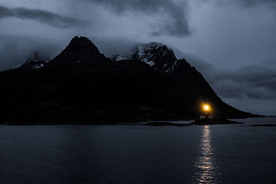 Scenic view of sea against sky at night