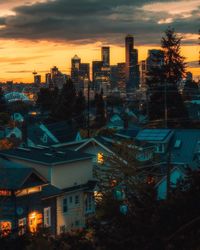 High angle view of buildings at sunset