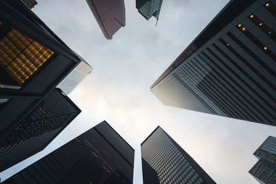 Low angle view of modern buildings against sky