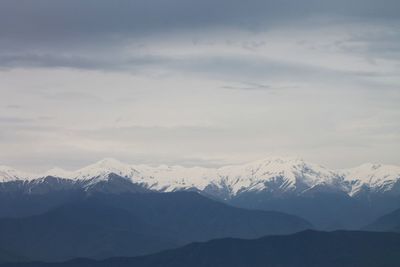 Scenic view of snowcapped mountains against sky - caucasus mountains 