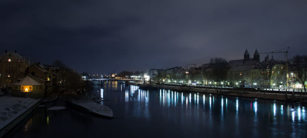 View of illuminated city at night