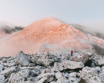 People standing on rocks