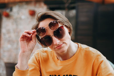 Portrait of woman wearing sunglasses