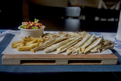 Close-up of food served on table